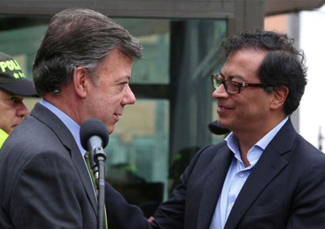 Bogota Mayor Gustavo Petro and Juan Manuel Santos.
