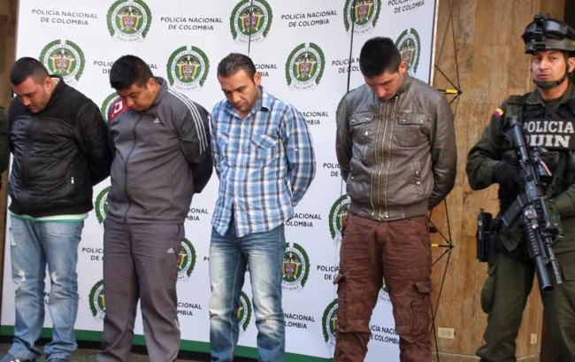 The captured taxi drivers accused of the death of DEA special agent Watson are presented at Police Headquarters.