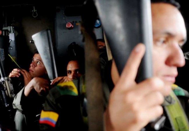 Colombian anti-narcotics police patrol southern Cauca.