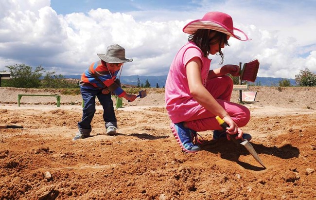 Children play excavate near Villa de Leyva, Boyacá.