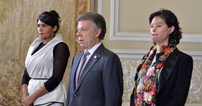 Natalia Ponce stands with Colombia's President Juan Manuel Santos