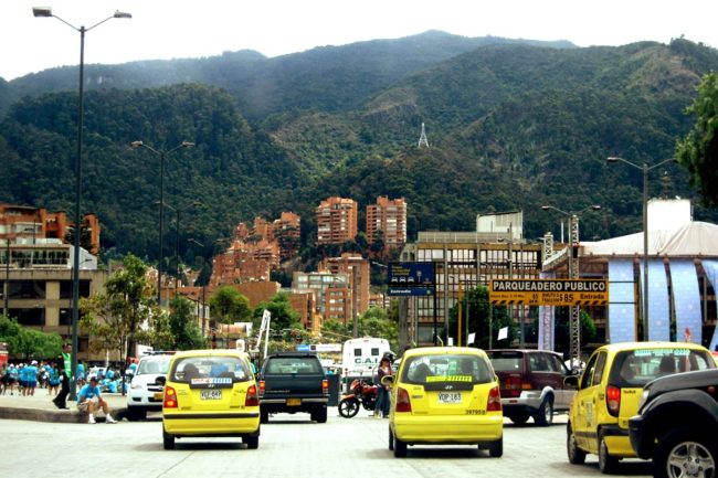 Taxis navigate traffic in Bogotá, Colombia