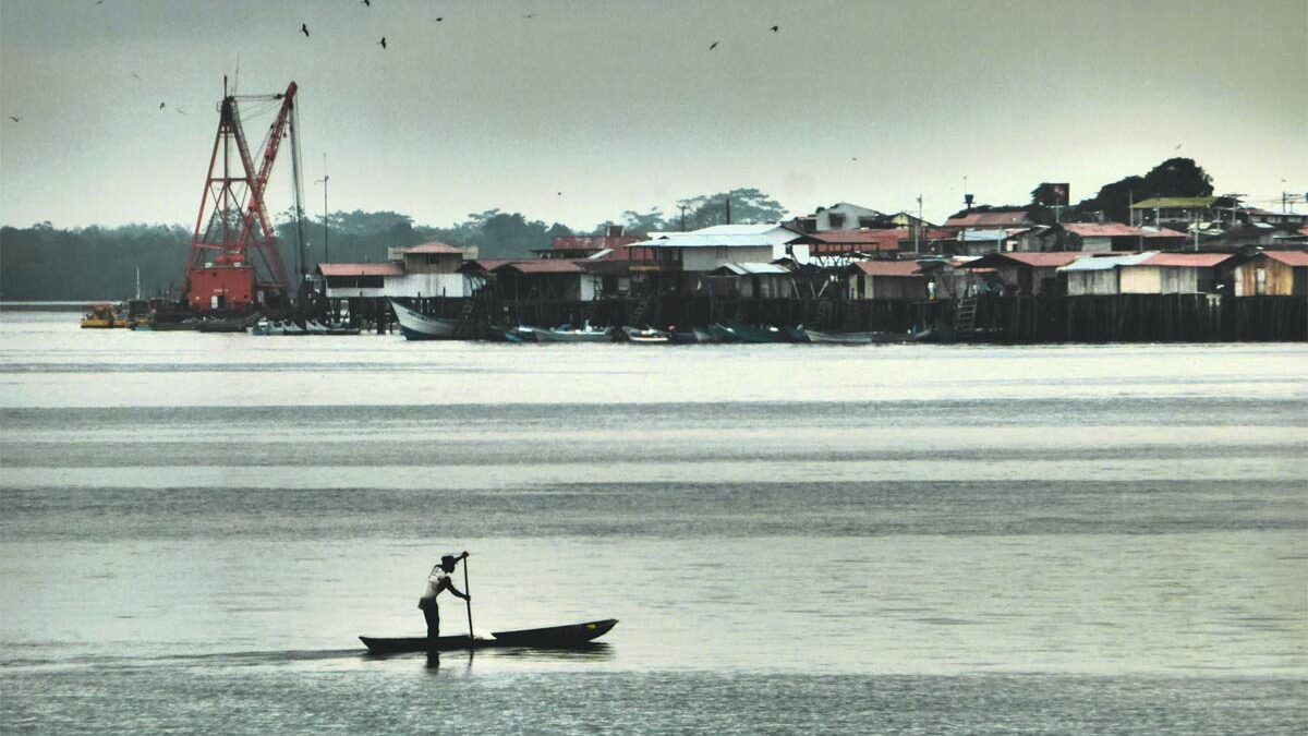 A fisherman navigates the waters near Tumaco, Colombia.