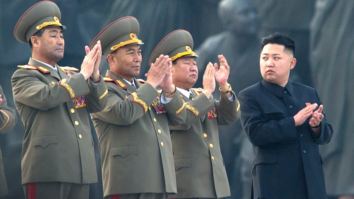 Kim Jong-Un stands with North Korean military leaders.