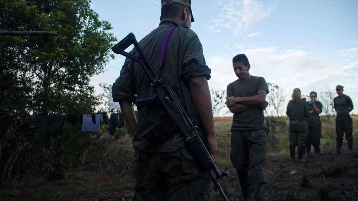 FARC rebels photographed in the Colombian countryside. (Photo by Carlos Bernate)