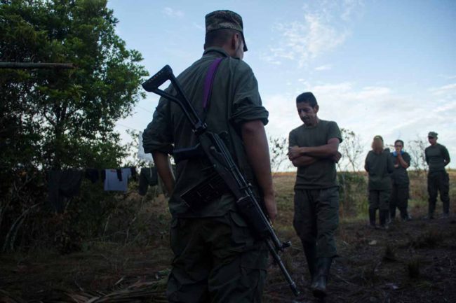 FARC rebels photographed in the Colombian countryside. (Photo by Carlos Bernate)