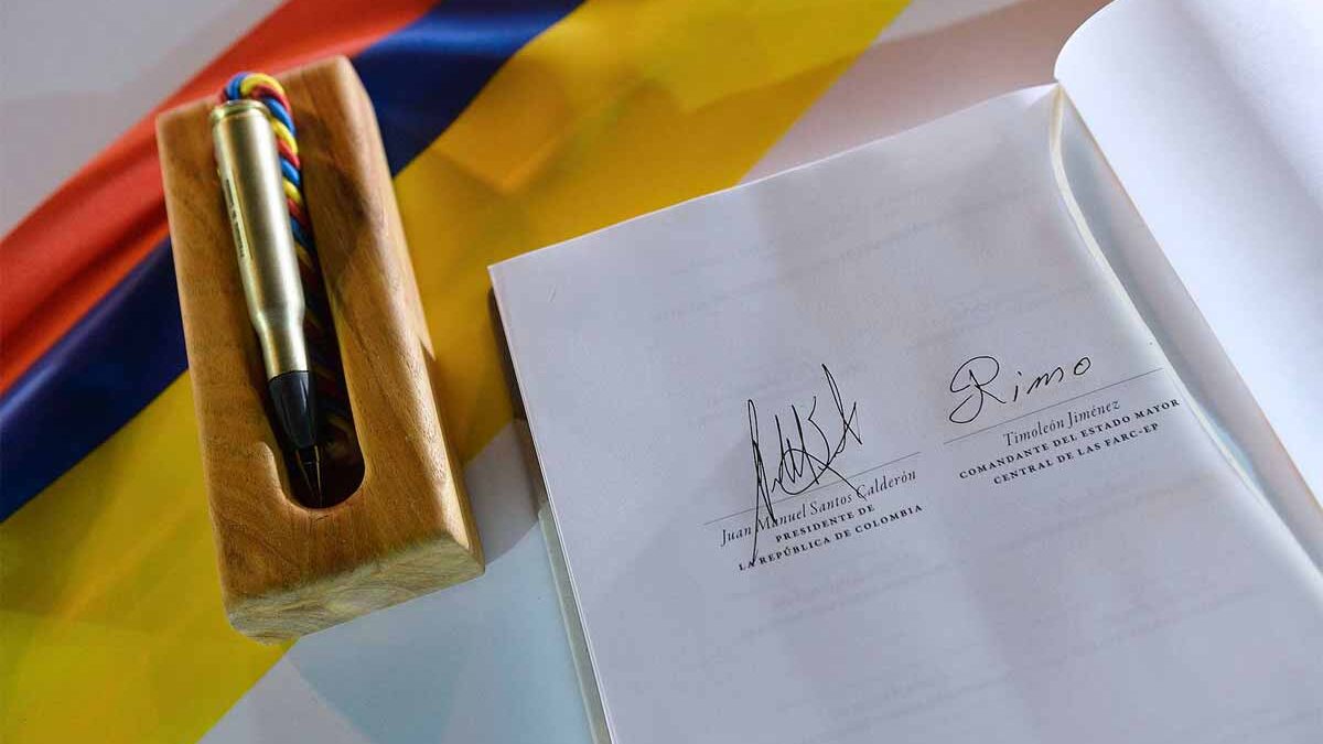 Colombia's signed peace agreement rests next to the bullet pen used to sign it. (Photo courtesy Presidencia de la Republica)