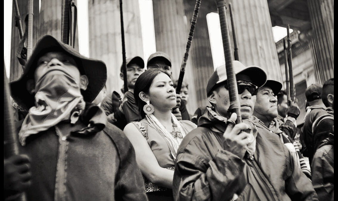 Members of Colombia's Indigenous Guard occupy the steps of Congress in a defiant act after President Petro warned lawmakers that should government reforms be limited there could be "revolution." Photo: Richard Emblin