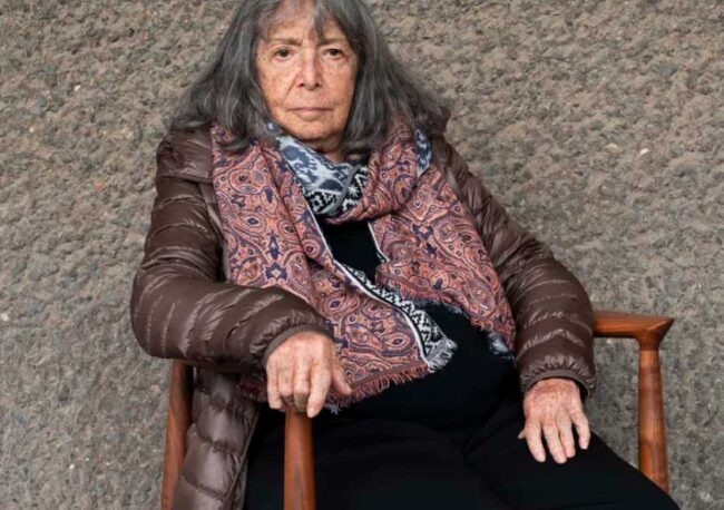 Portrait of Beatriz González, photographed at the Barbican, London, September 2024, ahead of a major retrospective of her work. © Louise Yeowart Barbican Art Gallery. Courtesy of the Barbican Centre.